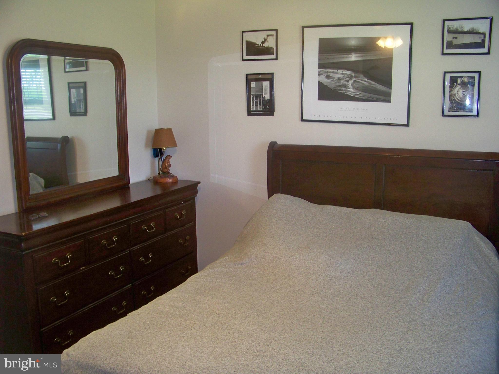 32 Green Acre Road Lititz, PA 17543 - Photo 14 of 21 a bedroom with a bed and a dresser