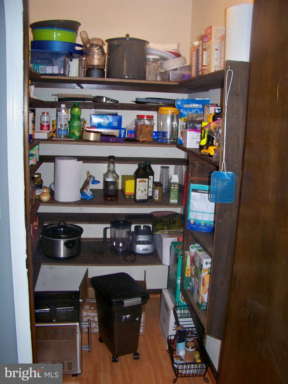 32 Green Acre Road Lititz, PA 17543 - Photo 17 of 21 a shelf with books and knick knacks on it