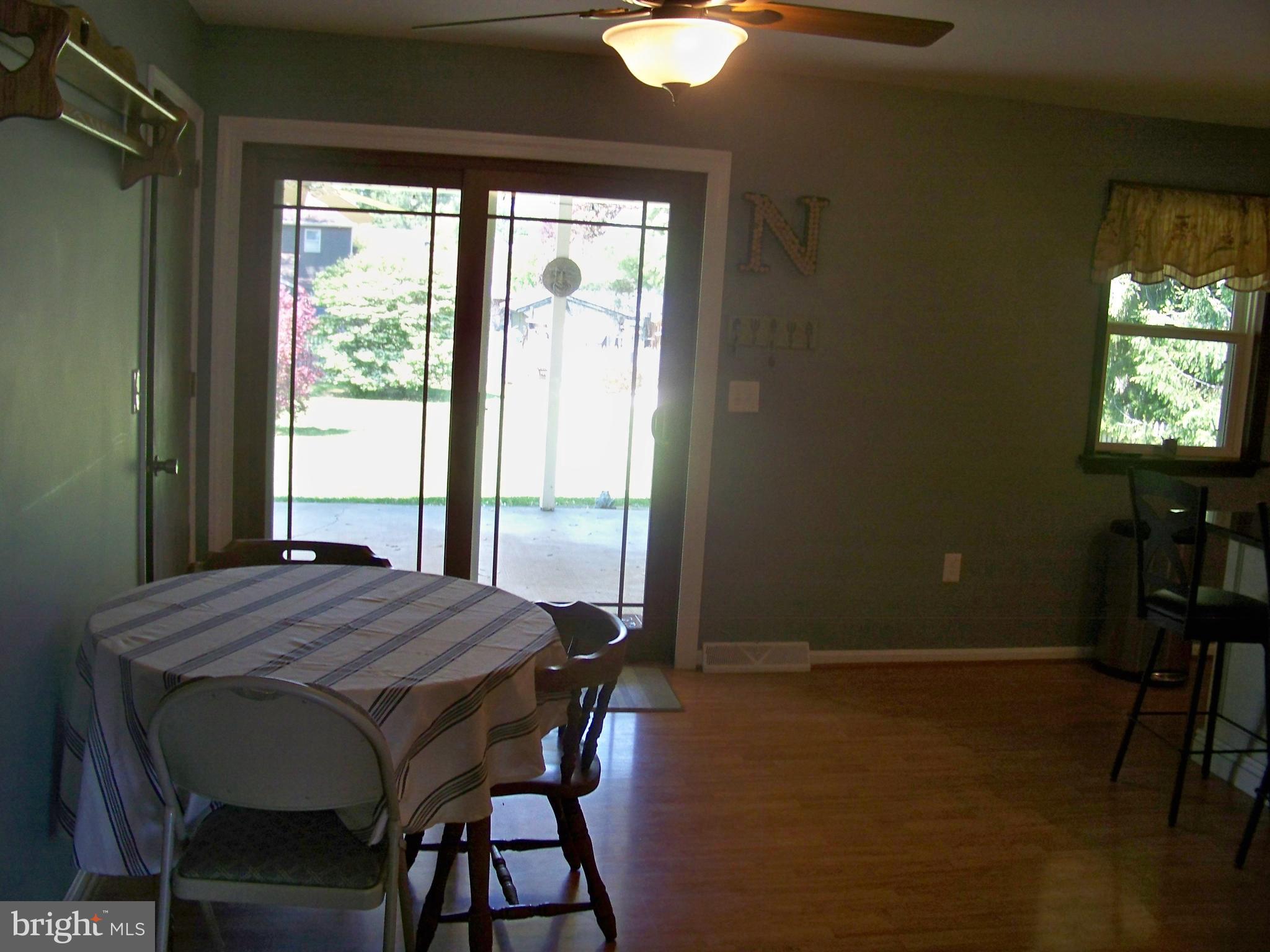 32 Green Acre Road Lititz, PA 17543 - Photo 10 of 21 a view of a dining room with furniture and a window