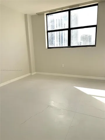 an empty room with a window