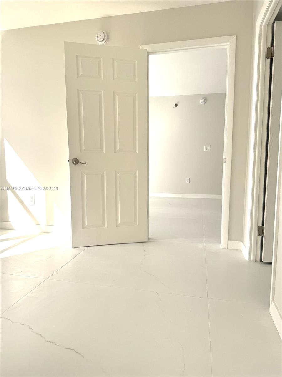 210 174th Street, Unit 1804 Sunny Isles Beach, FL 33160 - Photo 17 of 31 a view of an empty room
