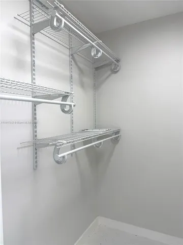 a bathroom with a shower toilet and a sink