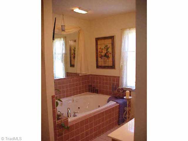 1078 Browder Farm Road Germanton, NC 27019 - Photo 6 of 9 Other. Upper Level Master Bath has custom jetted tub, custom ceramic tile, huge seperate shower also with ceramic tile, tile flooring, double vanity!