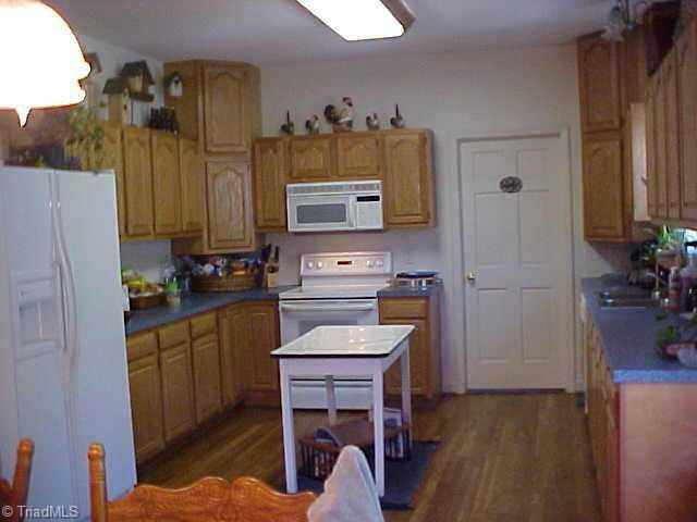 1078 Browder Farm Road Germanton, NC 27019 - Photo 7 of 9 Other. Awesome cabinet space, hardwoods and eat-in kitchen, smooth top range, built-in microwave, Double deck and fish pond leading off the kitchen. Many More Photos available --request via email kbennett1@triad.rr.com