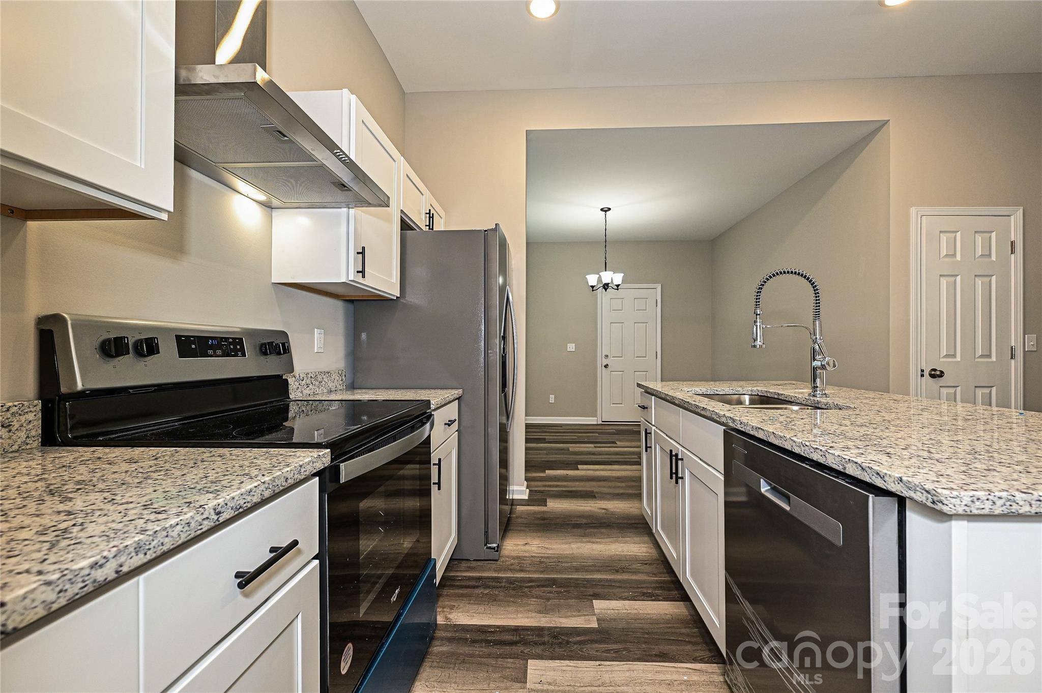624 Harrison Street Rock Hill, SC 29730 - Photo 13 of 25 a kitchen with granite countertop stainless steel appliances and sink