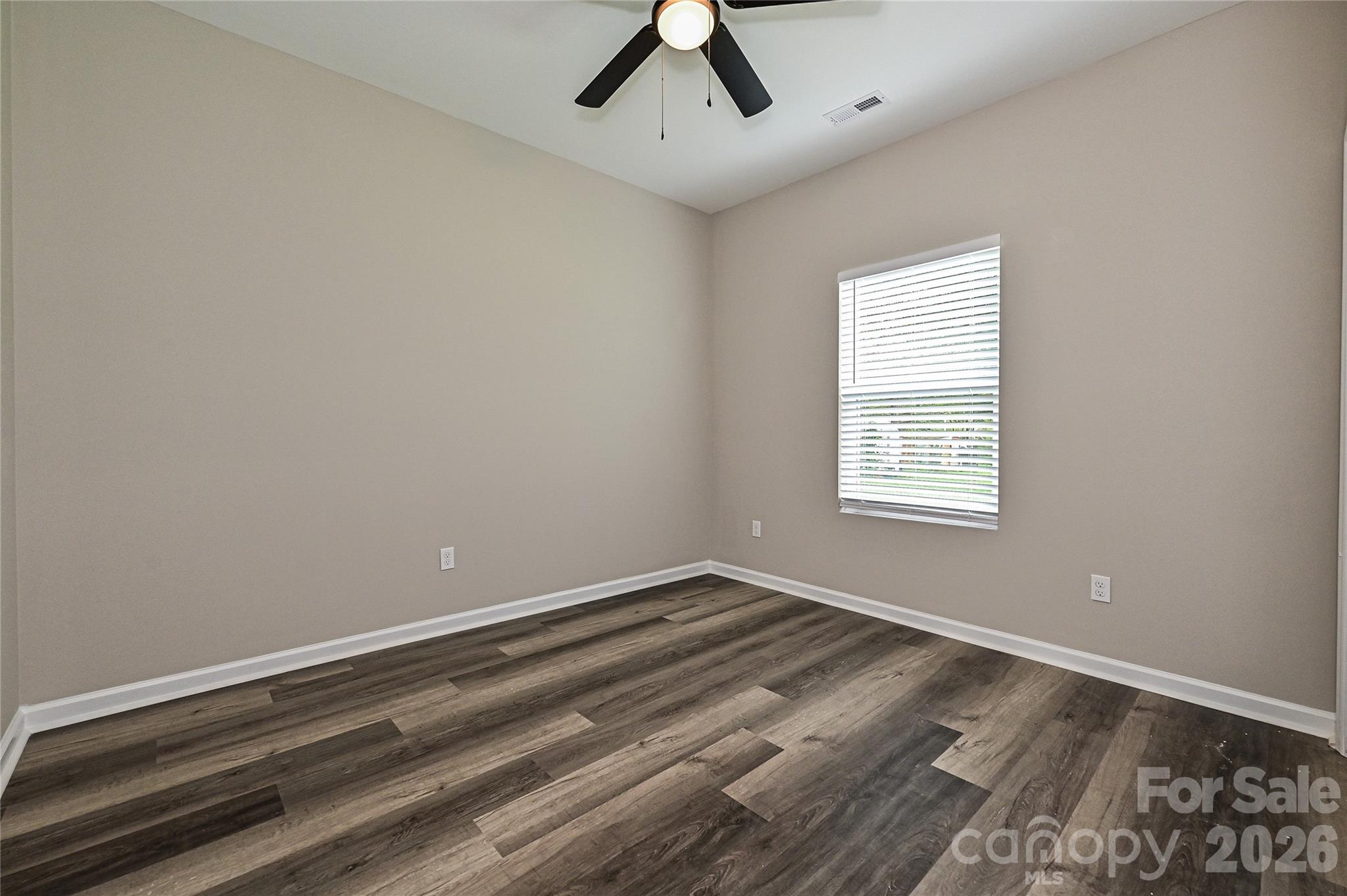624 Harrison Street Rock Hill, SC 29730 - Photo 21 of 25 wooden floor in an empty room with a window