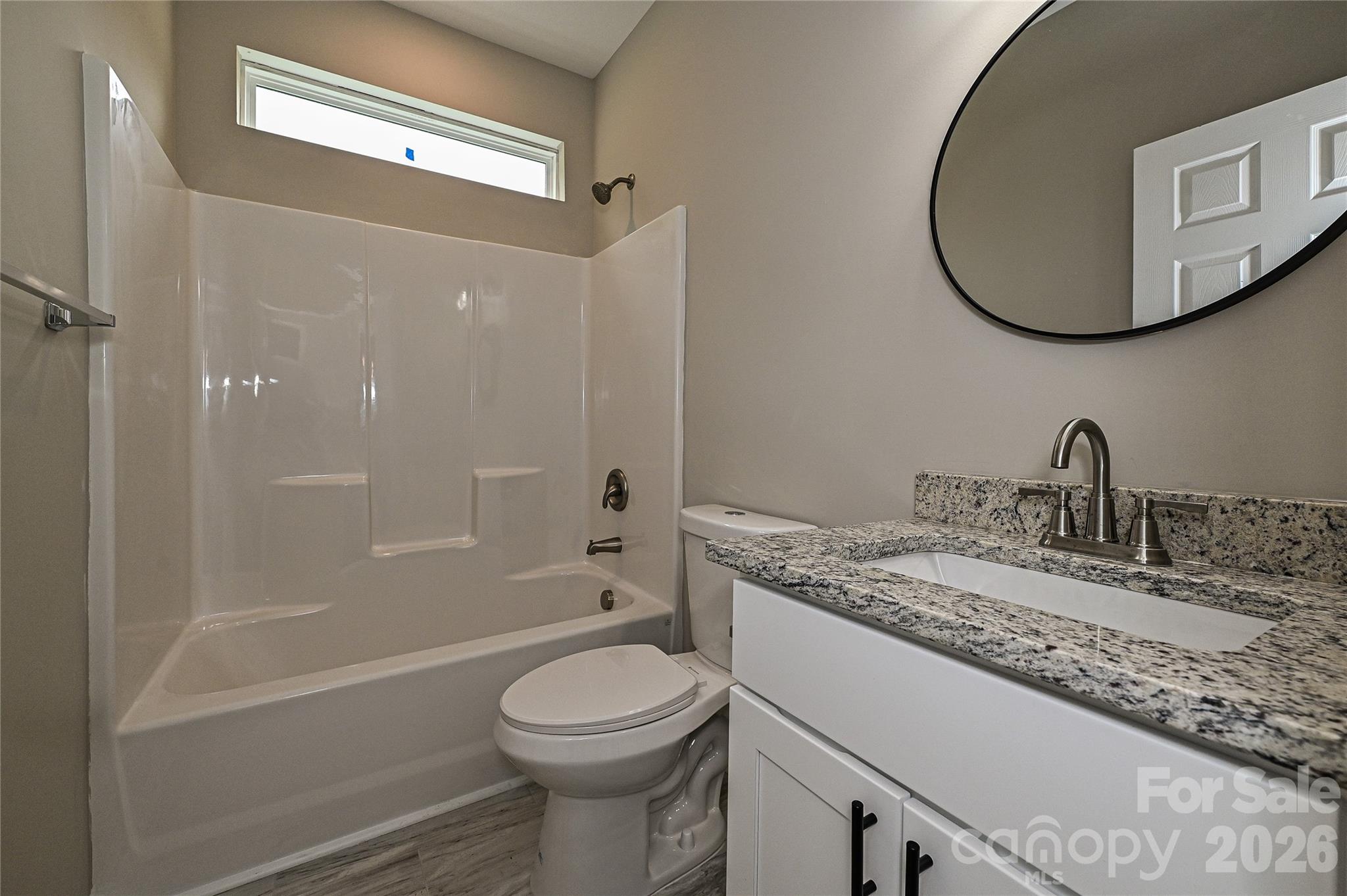 624 Harrison Street Rock Hill, SC 29730 - Photo 22 of 25 a bathroom with a granite countertop sink toilet and shower