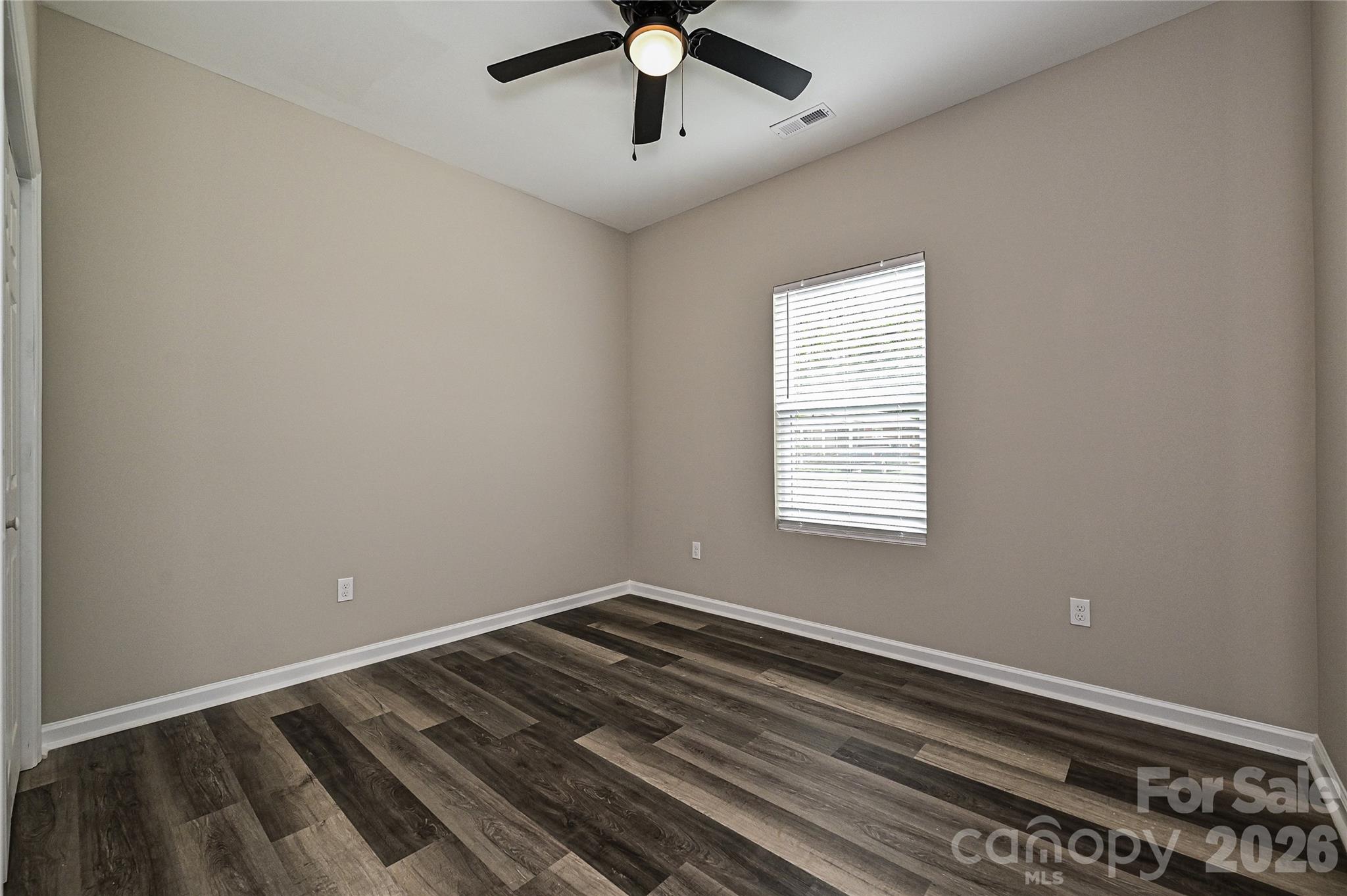624 Harrison Street Rock Hill, SC 29730 - Photo 23 of 25 a view of a room with a ceiling fan and wooden floor