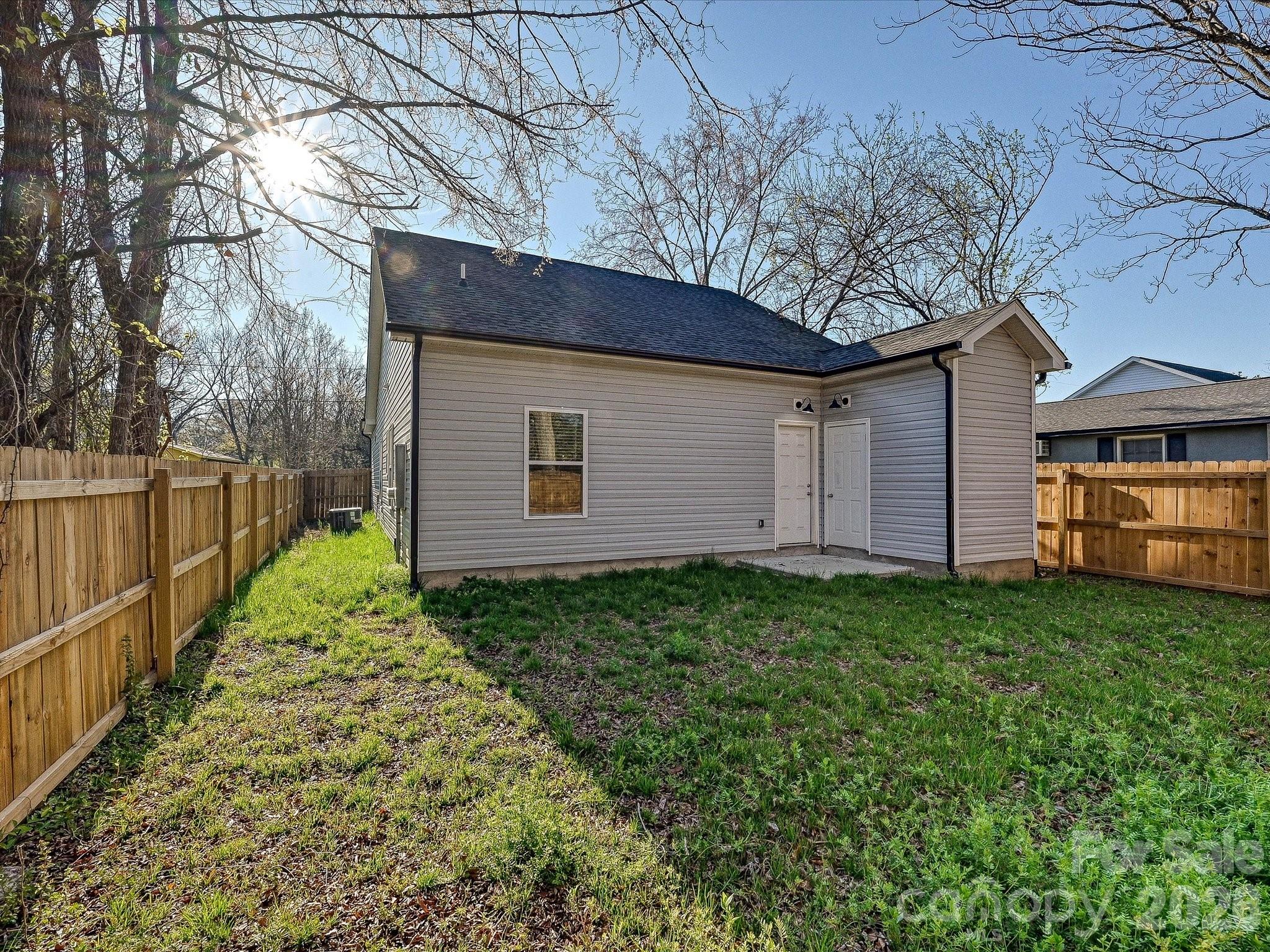 624 Harrison Street Rock Hill, SC 29730 - Photo 25 of 25 a view of a backyard with barn plants and large tree
