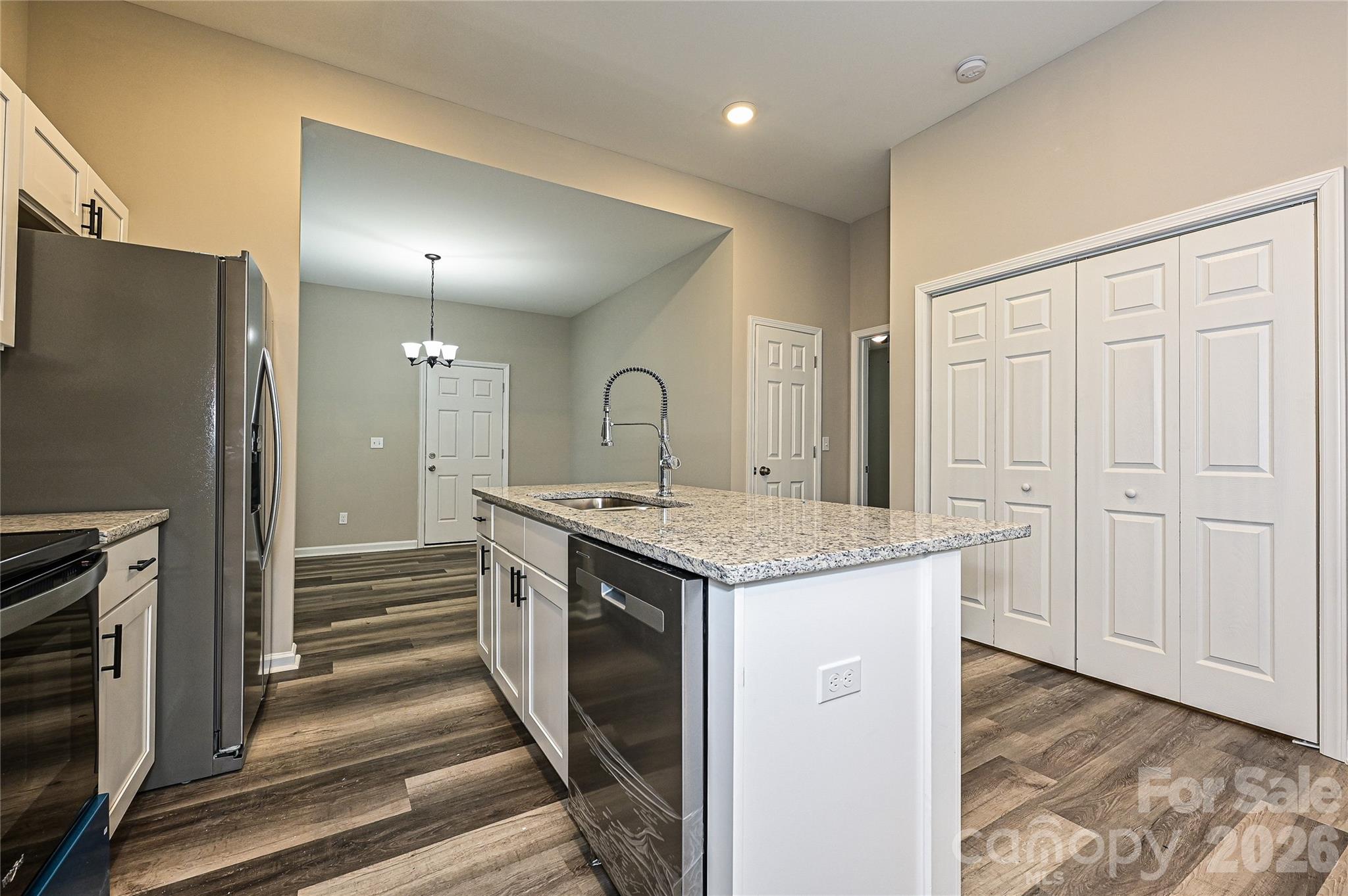 624 Harrison Street Rock Hill, SC 29730 - Photo 7 of 25 a kitchen with a sink and a refrigerator