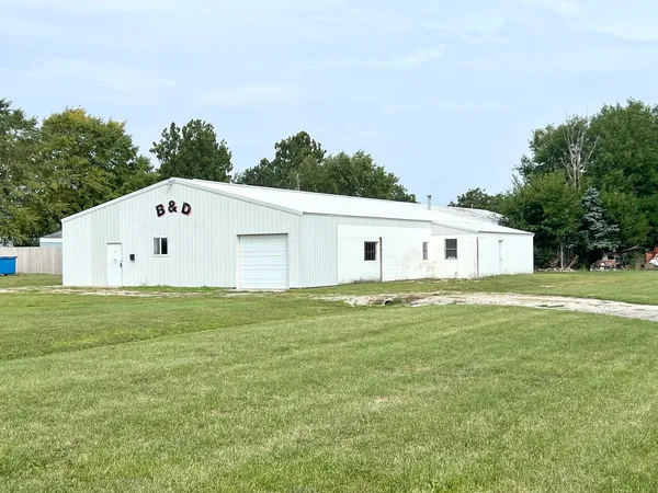 a view of a back yard of the house