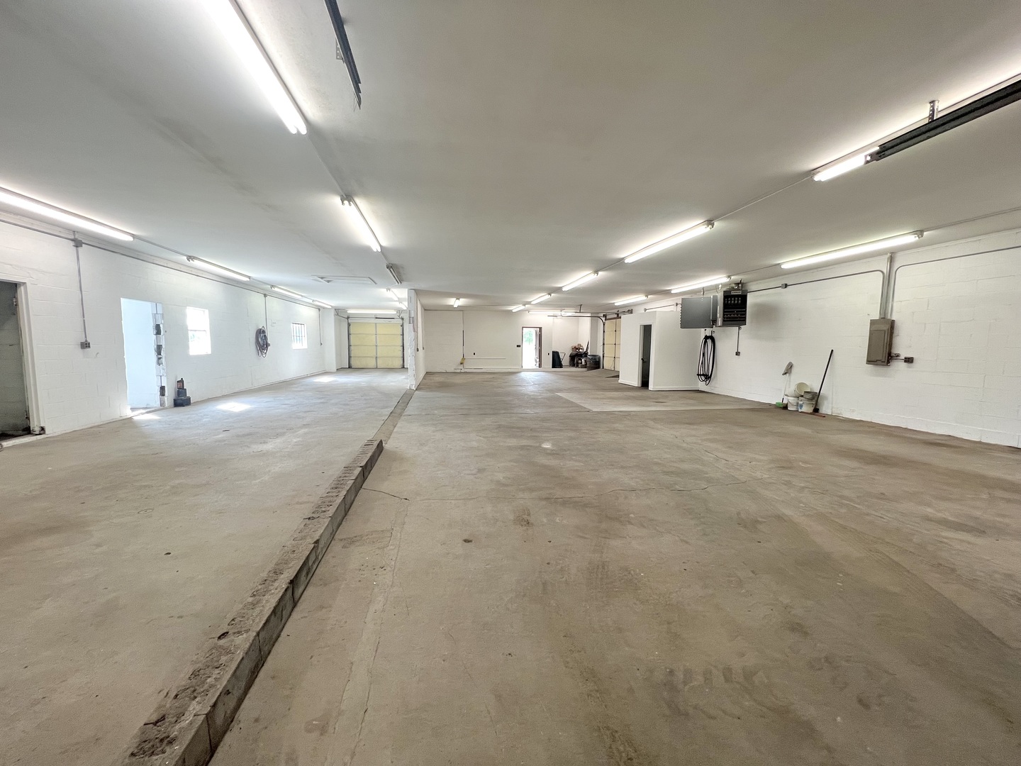 509 South Tanner Street Rantoul, IL 61866 - Photo 11 of 13 a large hall with a lot of gym equipment