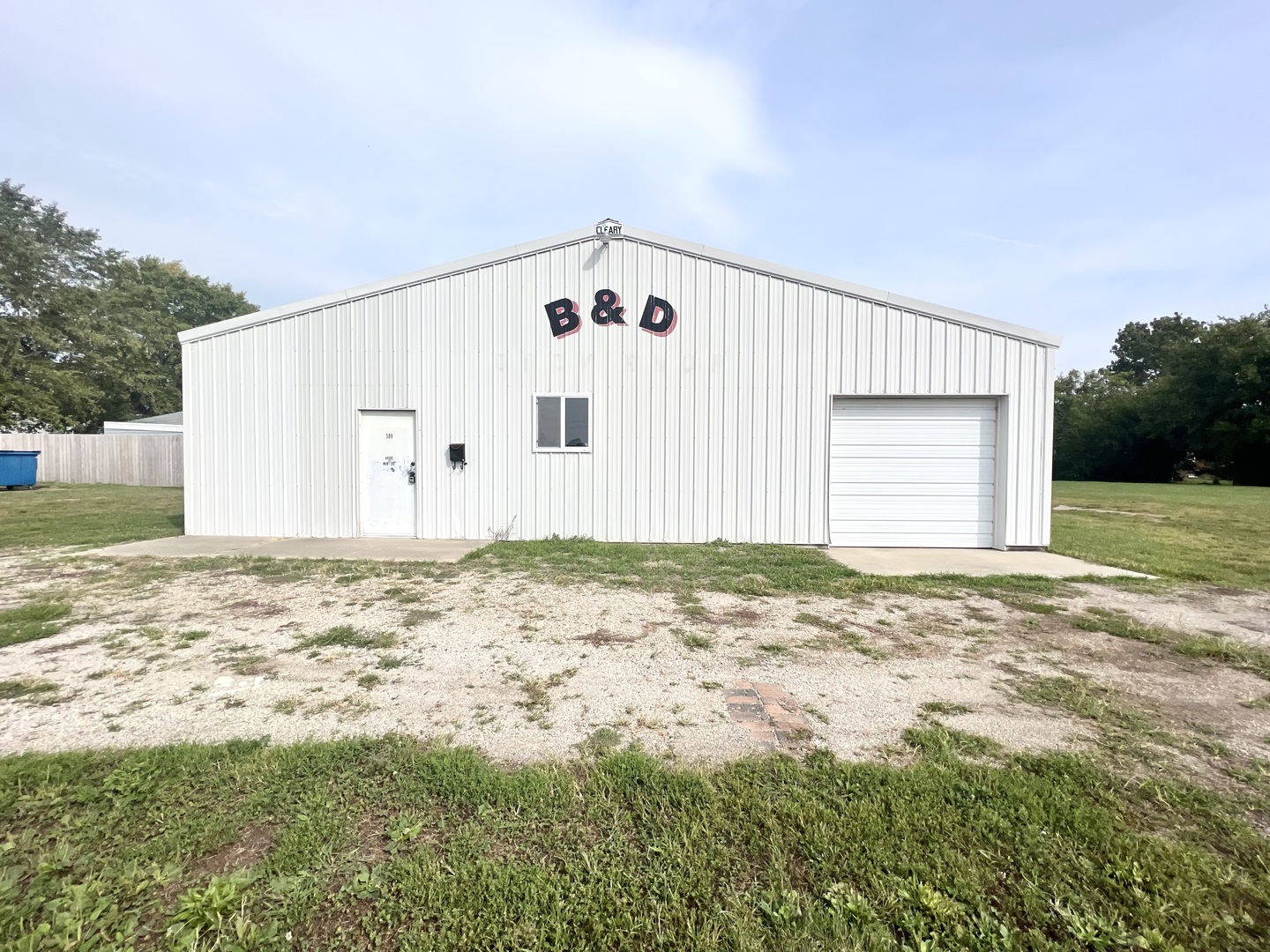 509 South Tanner Street Rantoul, IL 61866 - Photo 2 of 13 a view of a house with backyard and trees