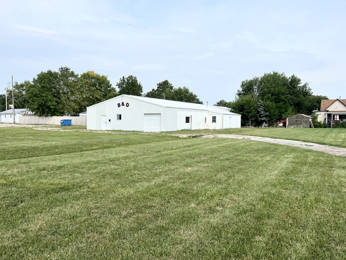 509 South Tanner Street Rantoul, IL 61866 - Photo 4 of 13 a swimming pool is in the middle of a field