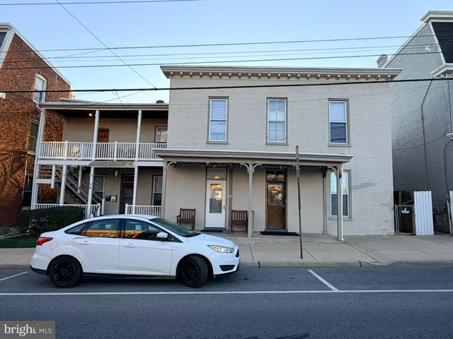 a car parked in front of a building