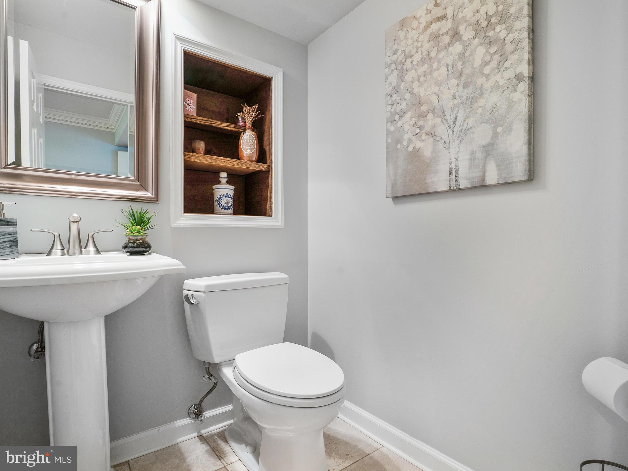 8801 Warfield Road Gaithersburg, MD 20882 - Photo 22 of 49 Main Level Half Bathroom