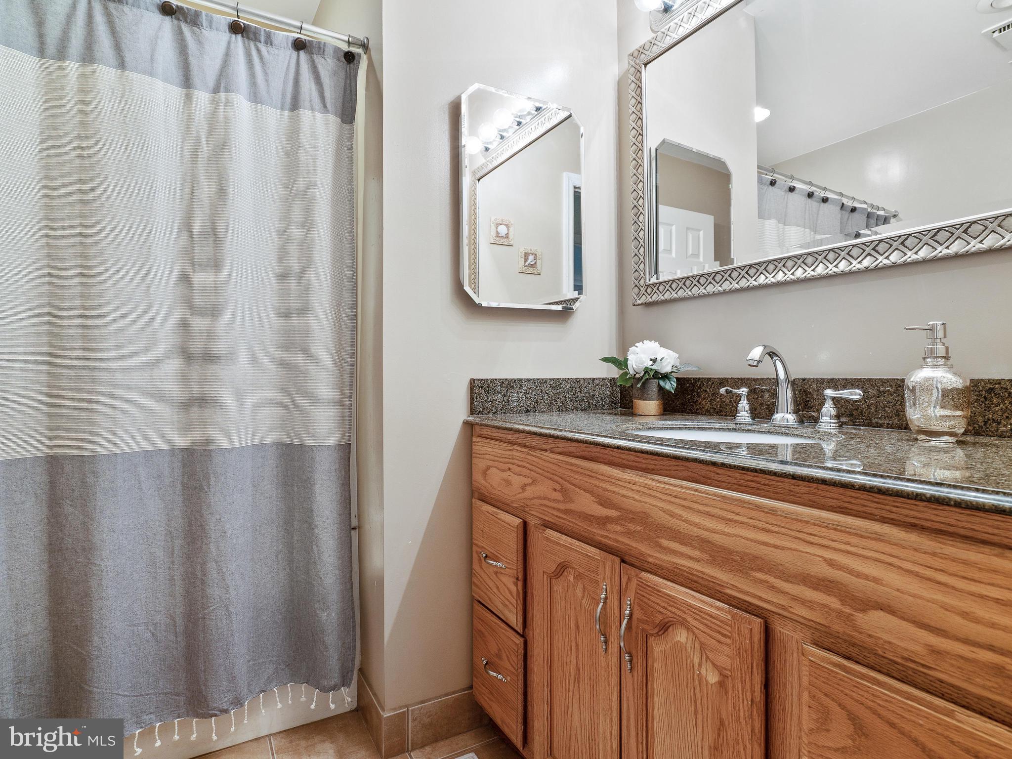 8801 Warfield Road Gaithersburg, MD 20882 - Photo 27 of 49 Upper Level Full Bathroom
