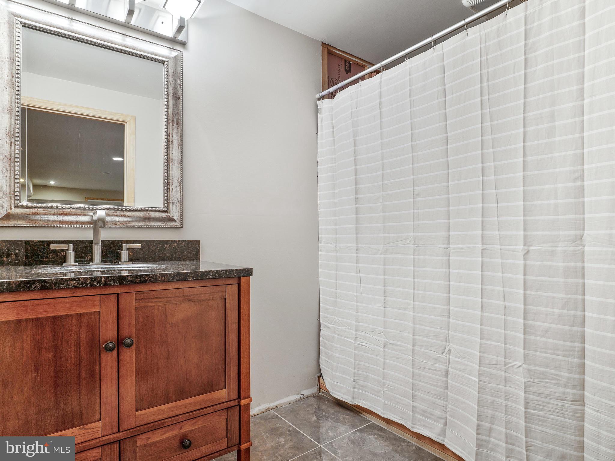 8801 Warfield Road Gaithersburg, MD 20882 - Photo 38 of 49 Basement Level Bathroom