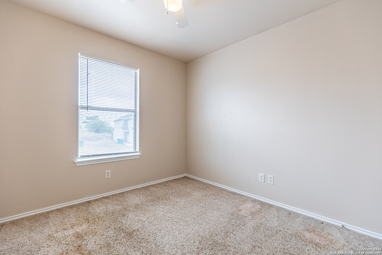 10711 Mathom Landing, Unit 1 Universal City, TX 78148 - Photo 27 of 31 an empty room with windows