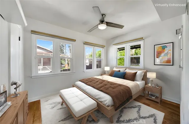 a bedroom with a bed and window