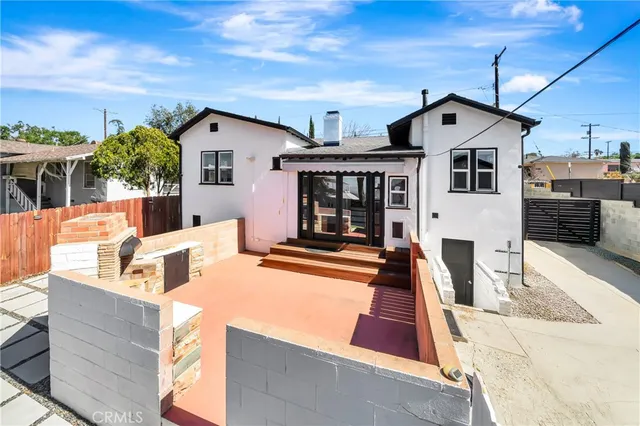 a view of a house with a patio