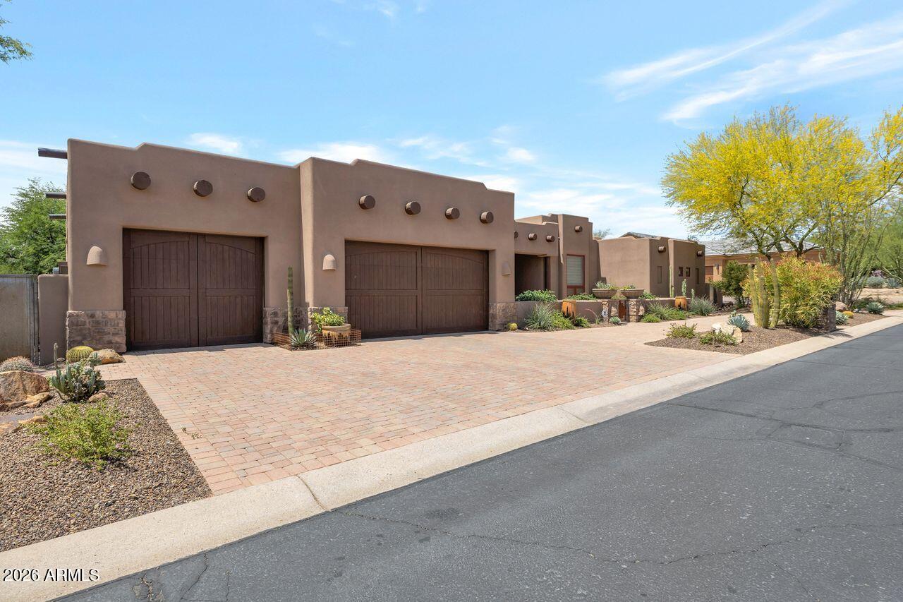 18507 East Picacho Road Rio Verde, AZ 85263 - Photo 31 of 33 a picture of a house with a yard
