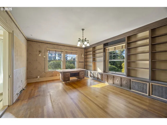 a bathroom with a sink toilet and a mirror