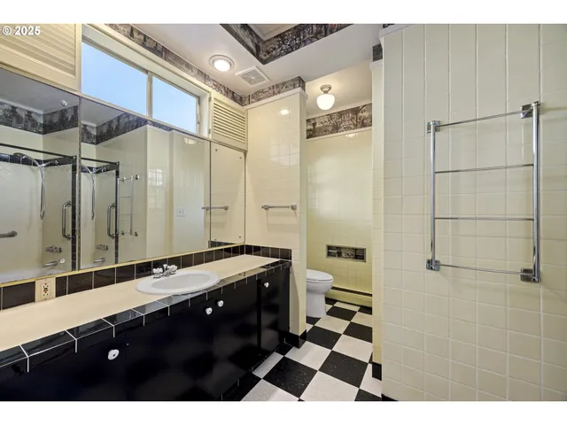 a bathroom with a sink and mirror