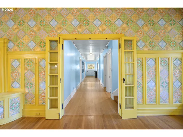 a view of a living room with a large window