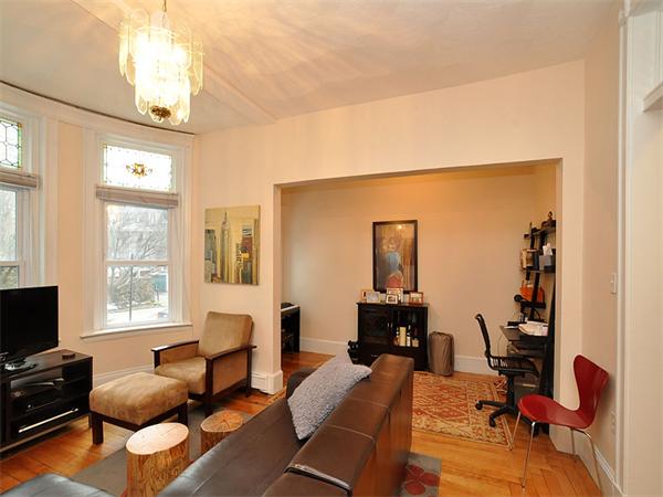 12 Kilsyth Road, Unit 1 Brookline, MA 02445 - Photo 2 of 9 a view of a livingroom with workspace and a window