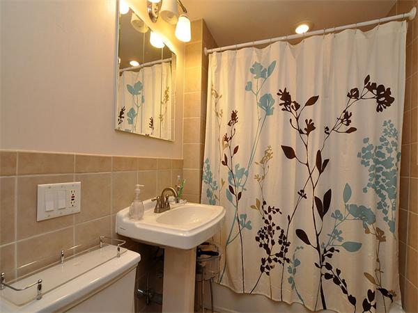 12 Kilsyth Road, Unit 1 Brookline, MA 02445 - Photo 6 of 9 a bathroom with a sink and mirror