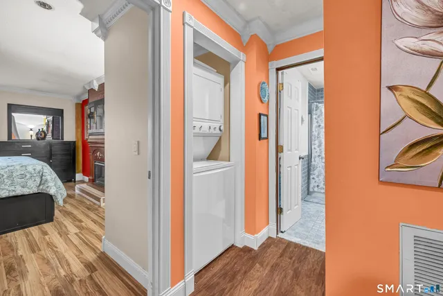 a view of a bedroom from a hallway