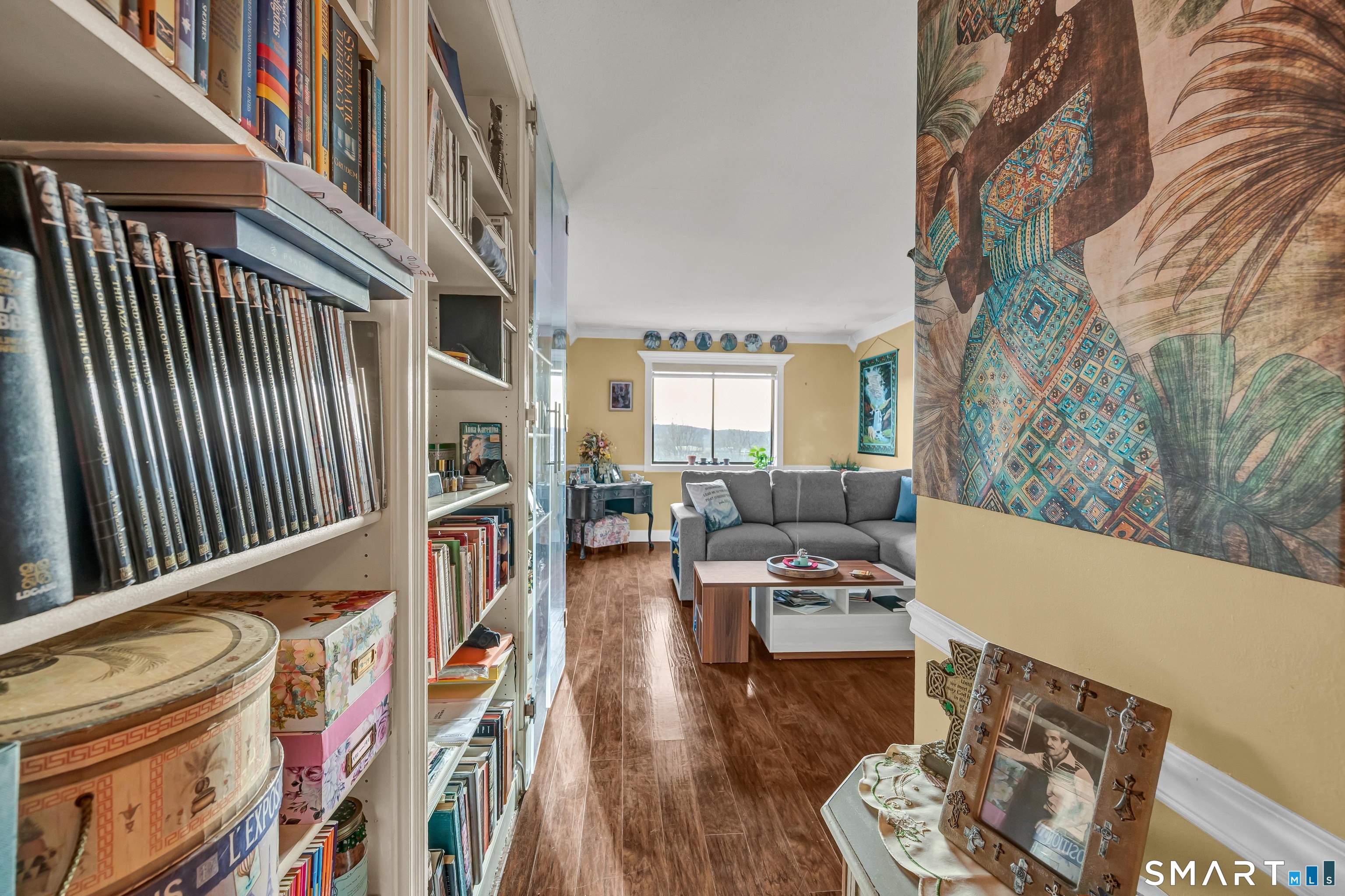 166 Old Brookfield Road, Unit 18A6 Danbury, CT 06811 - Photo 3 of 19 a living room with furniture and a fireplace