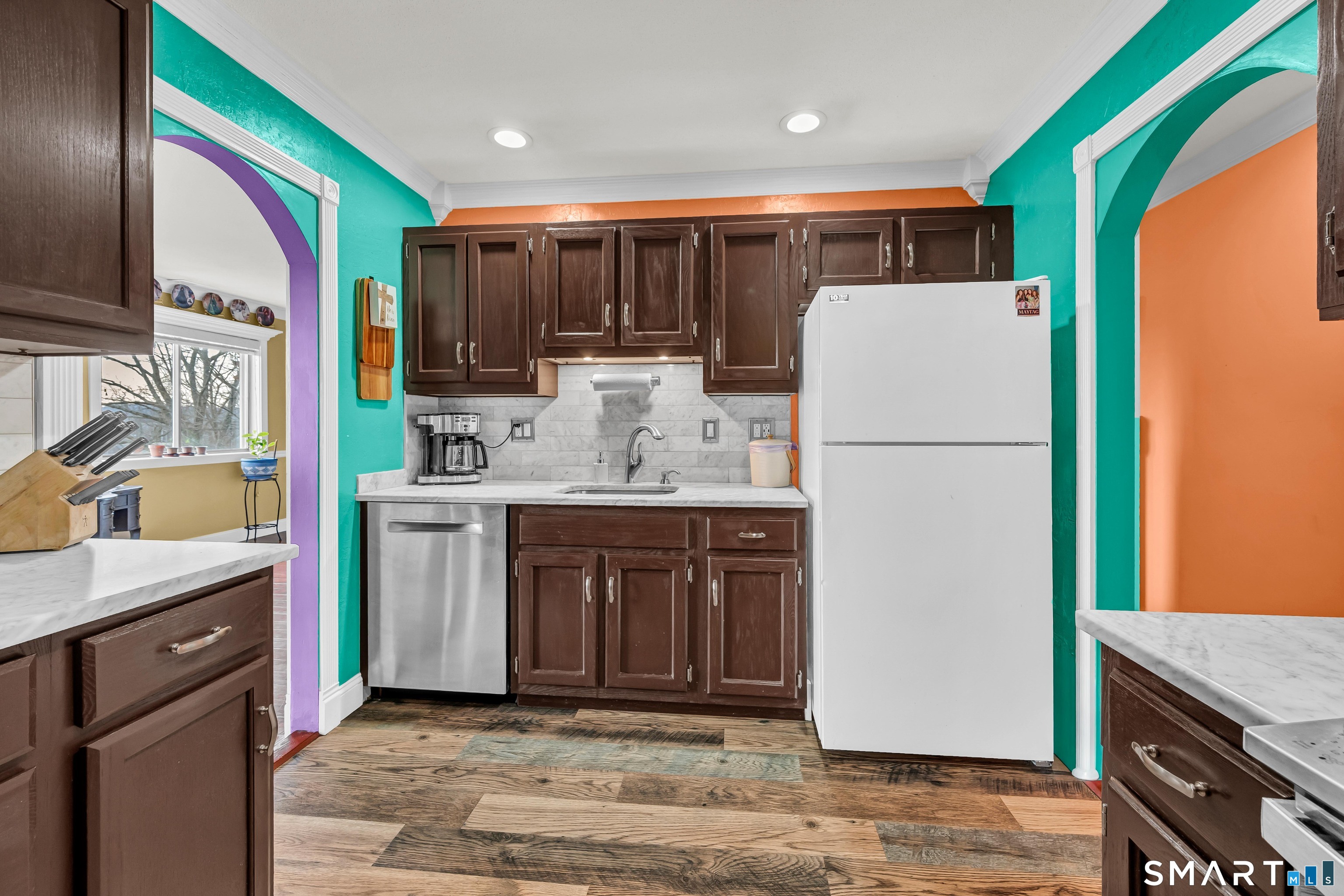 166 Old Brookfield Road, Unit 18A6 Danbury, CT 06811 - Photo 10 of 19 a kitchen with a refrigerator sink and stove