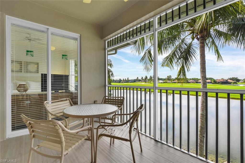 7925 Mahogany Run Lane, Unit 924 Naples, FL 34113 - Photo 27 of 40 a view of a chairs and table in the patio