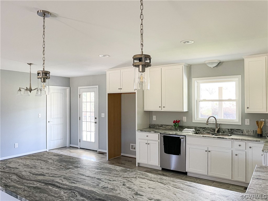 292 Wilson Road Blackstone, VA 23824 - Photo 6 of 48 a kitchen with a refrigerator a sink and a window
