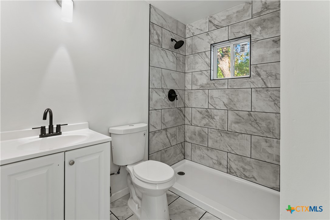 1807 South 11th Street Temple, TX 76504 - Photo 13 of 27 Remodeled Bathroom