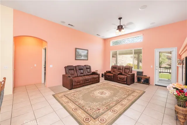 a bathroom with a sink vanity mirror and toilet