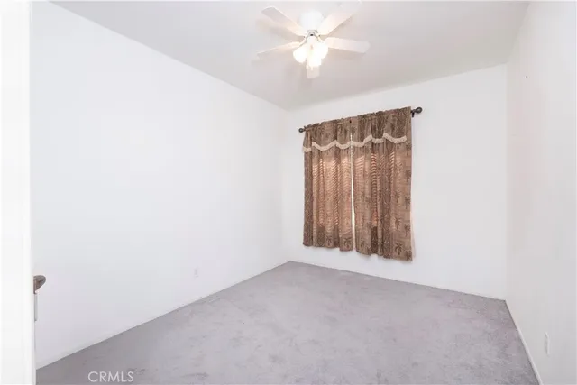 a living room with a couch and a shower
