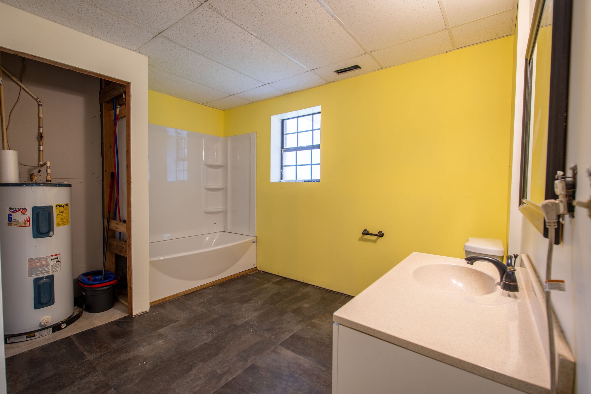 323 Spring Creek Road Lawrenceburg, TN 38464 - Photo 26 of 49 a bathroom with a sink a bath tub and a shower