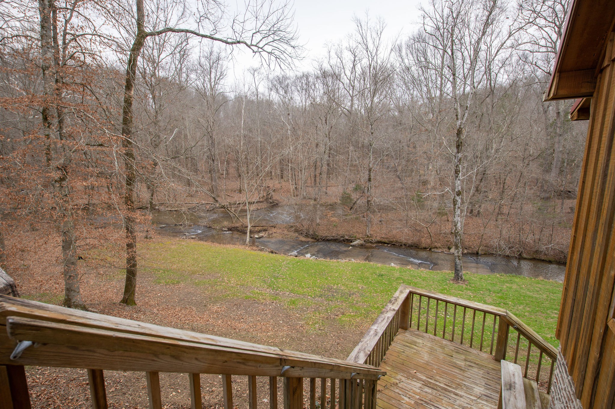323 Spring Creek Road Lawrenceburg, TN 38464 - Photo 7 of 49 a view of a balcony with yard
