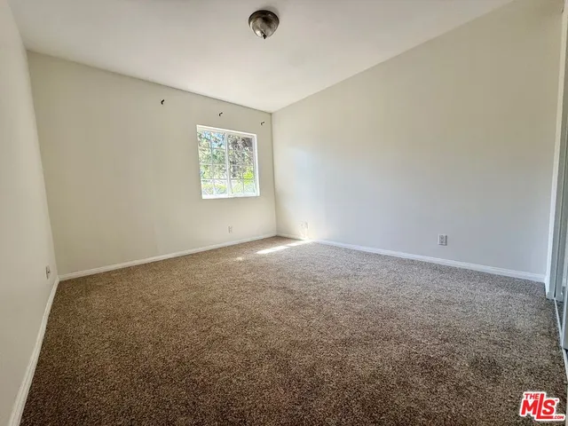 an empty room with a workbench