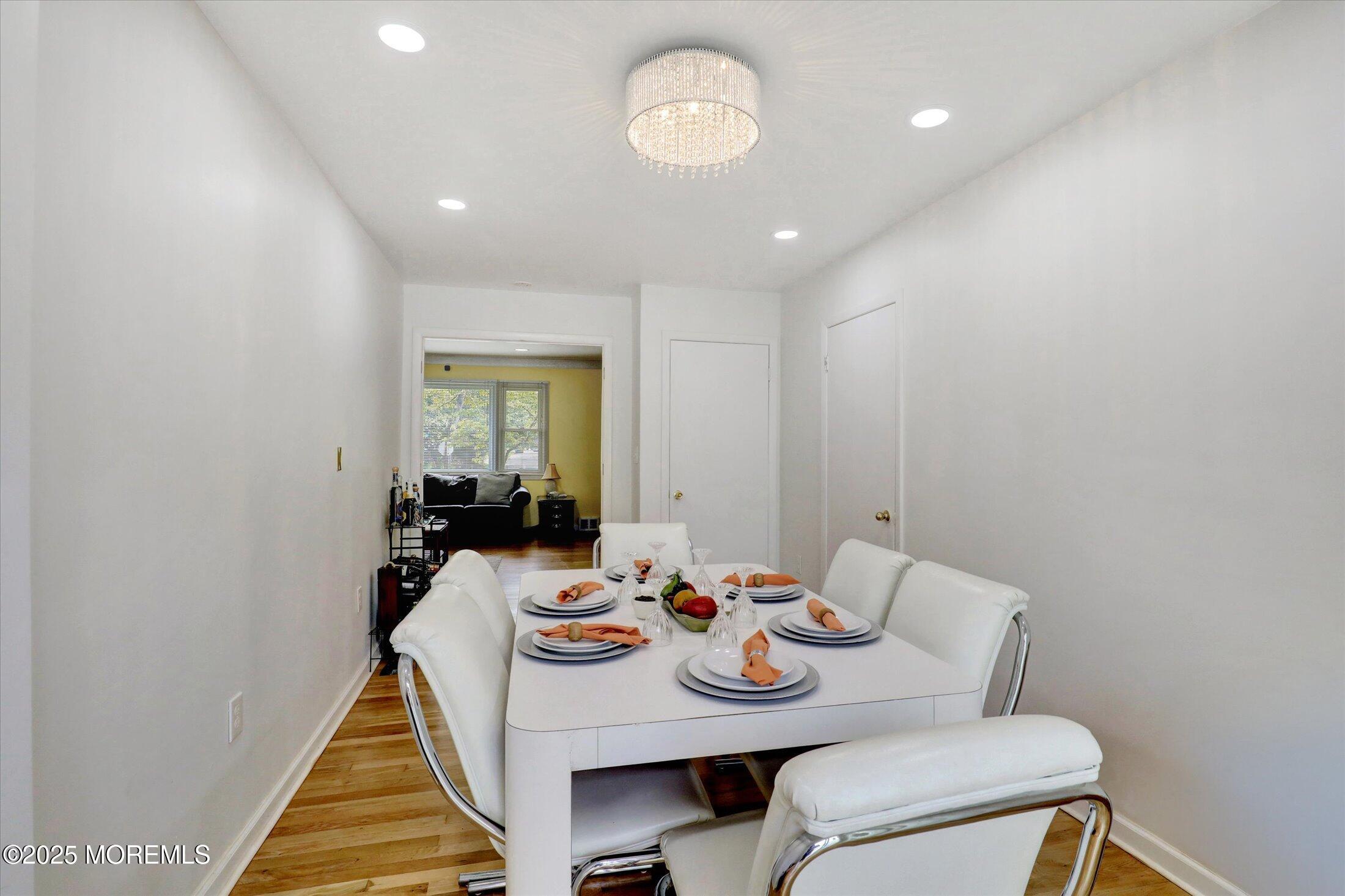 24 Berger Avenue Oakhurst, NJ 07755 - Photo 20 of 49 a view of a dining room with furniture