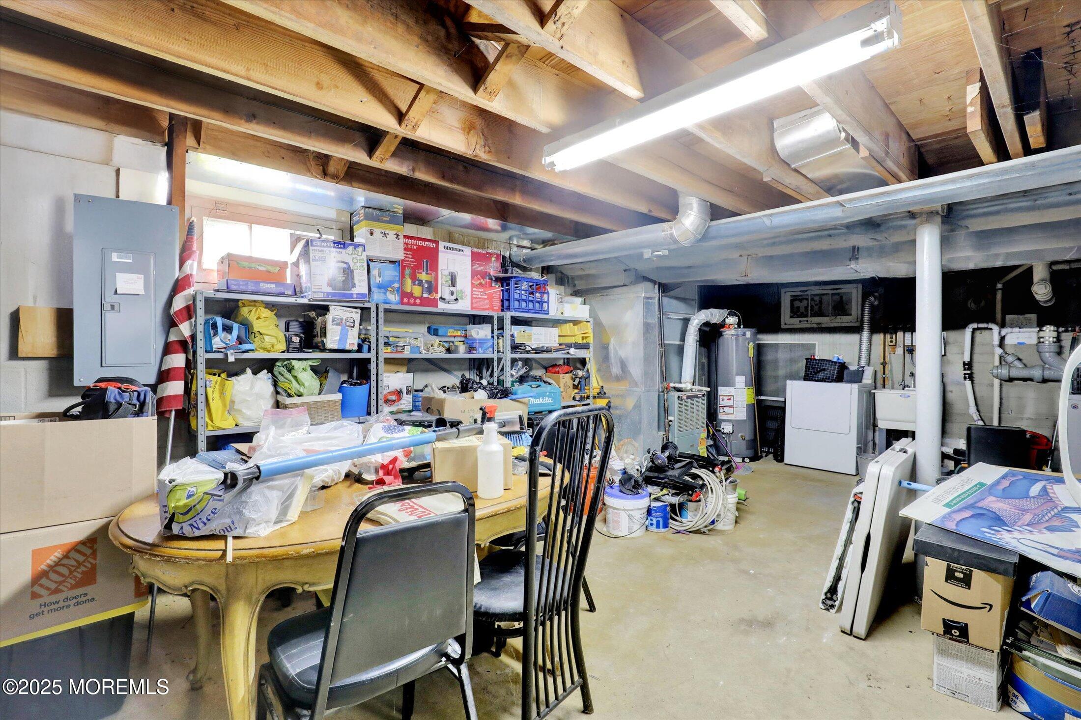 24 Berger Avenue Oakhurst, NJ 07755 - Photo 33 of 49 a room with stainless steel appliances kitchen island granite countertop furniture and a kitchen view