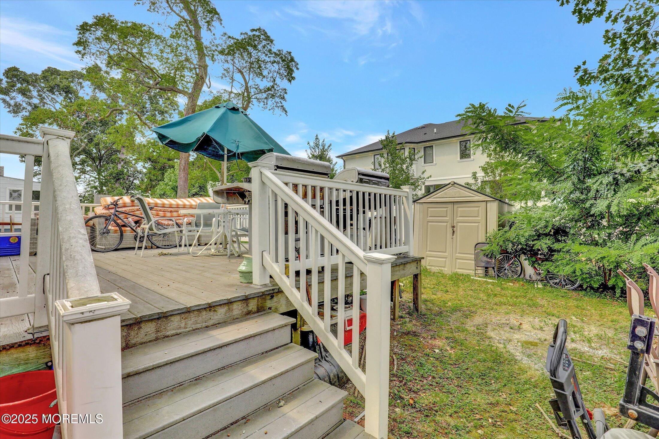 24 Berger Avenue Oakhurst, NJ 07755 - Photo 38 of 49 a view of outdoor space and deck
