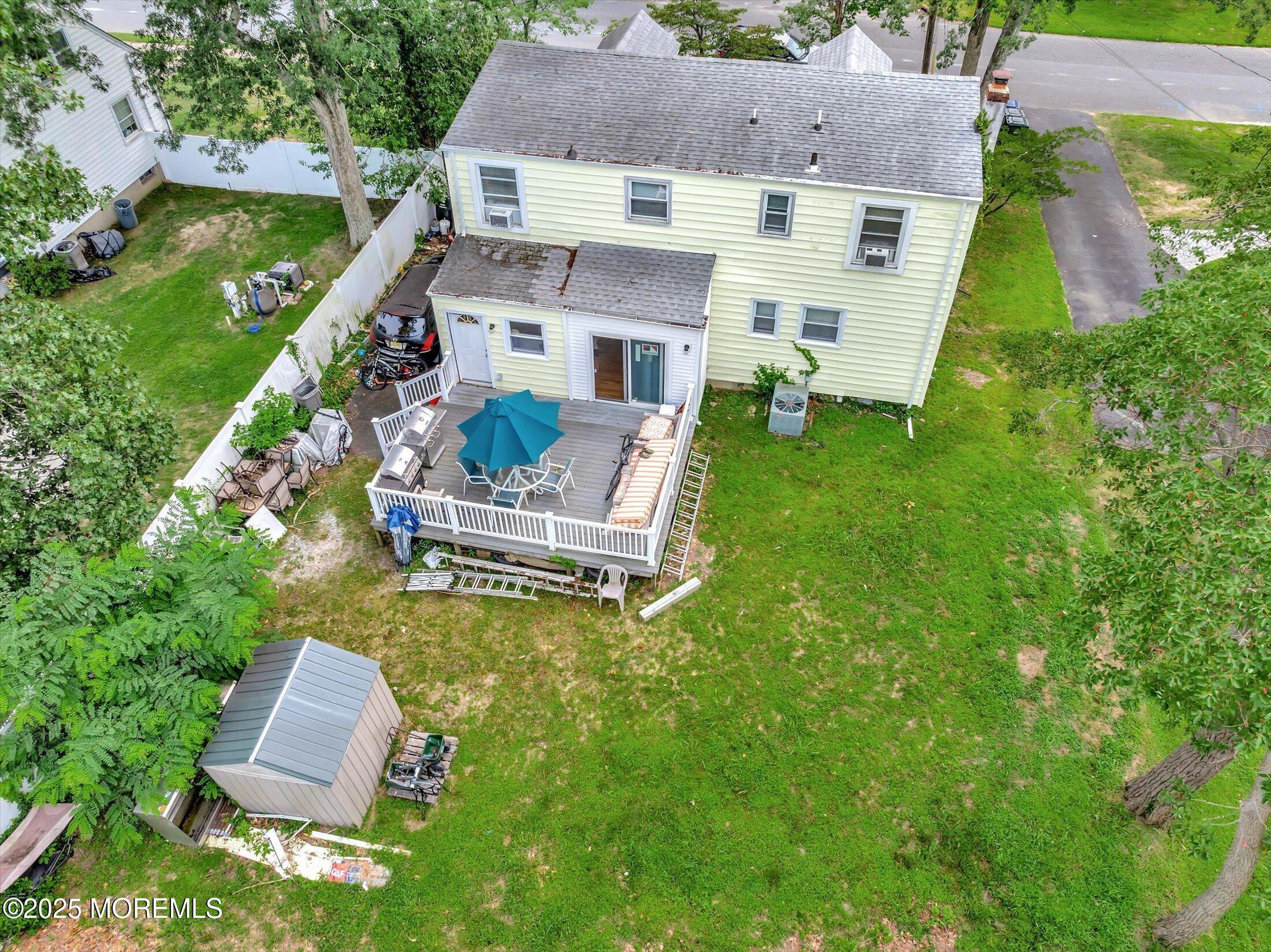 24 Berger Avenue Oakhurst, NJ 07755 - Photo 40 of 49 an aerial view of a house