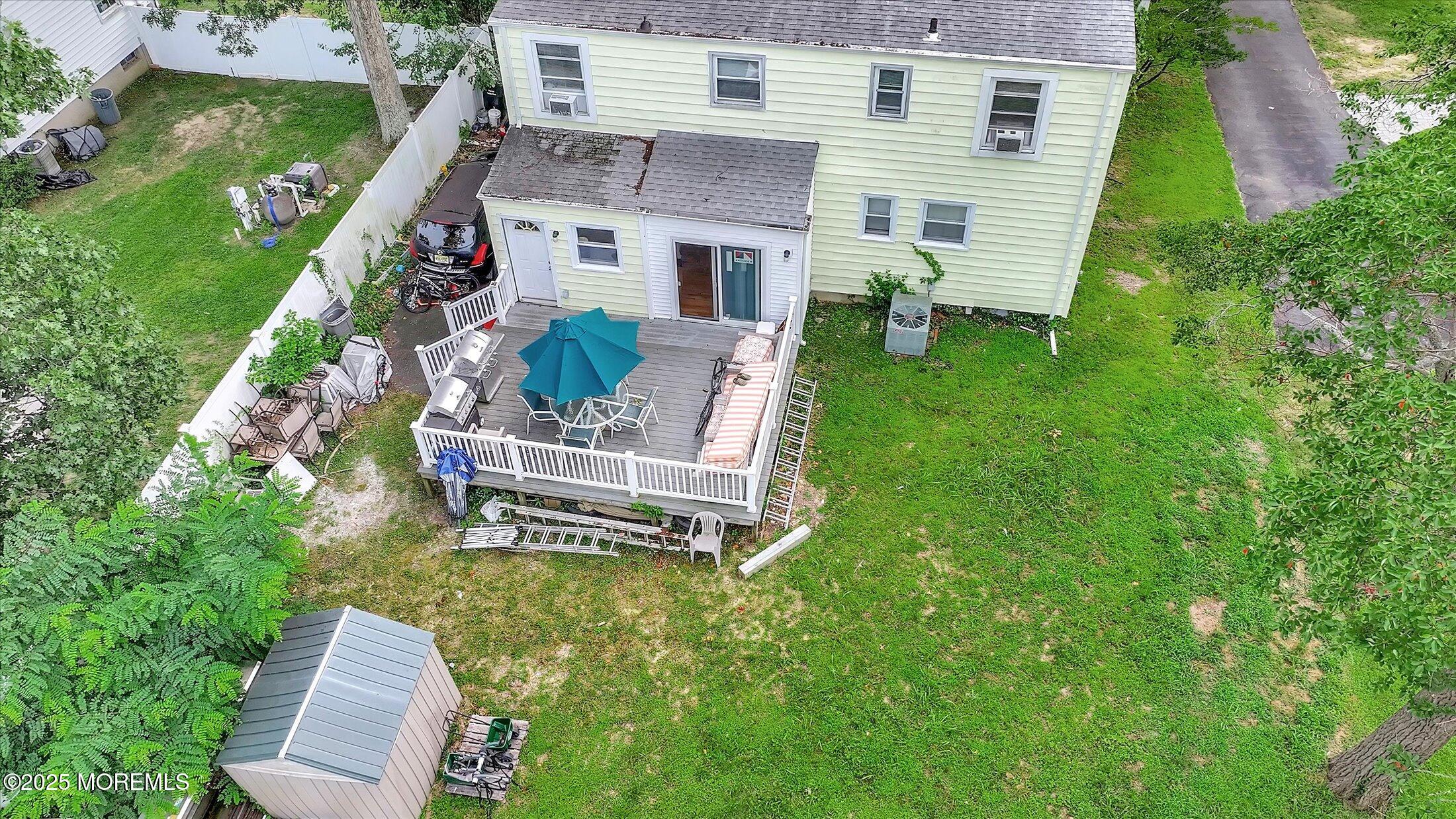 24 Berger Avenue Oakhurst, NJ 07755 - Photo 42 of 49 an aerial view of a house