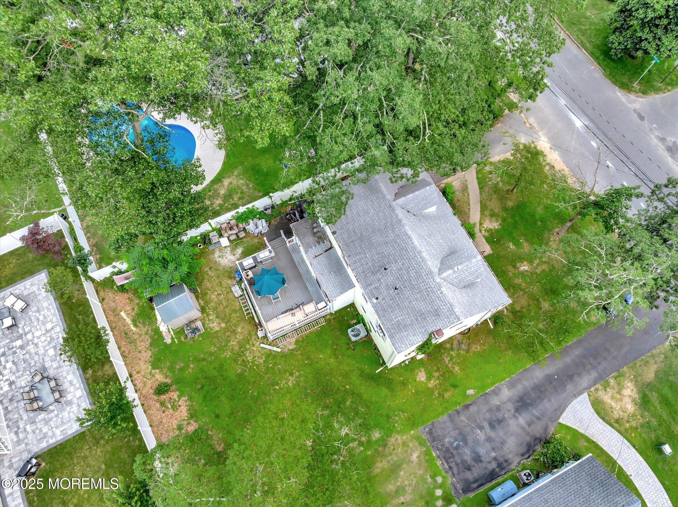 24 Berger Avenue Oakhurst, NJ 07755 - Photo 46 of 49 an aerial view of a house