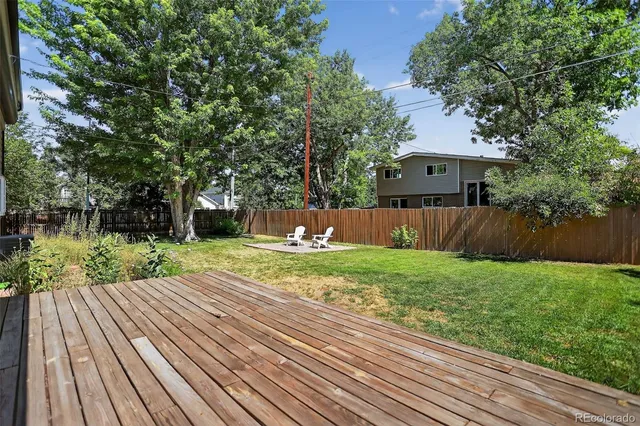 a view of a backyard with a garden