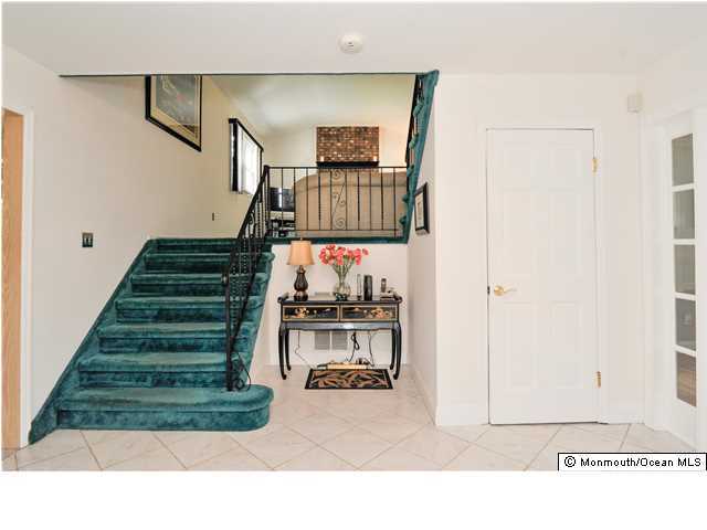41 Eaglenest Road Freehold, NJ 07728 - Photo 11 of 16 a picture of stairs